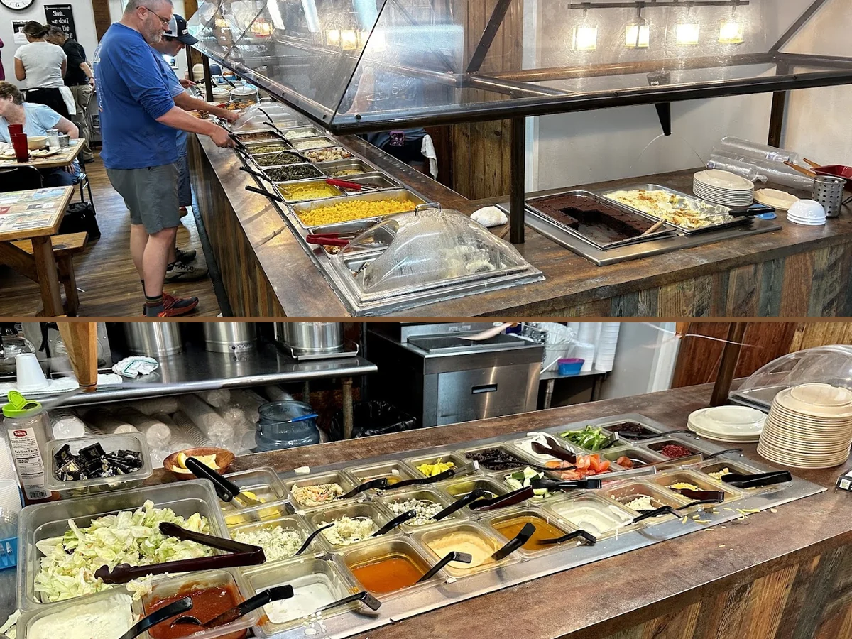 Seafood buffet setup with serving pans